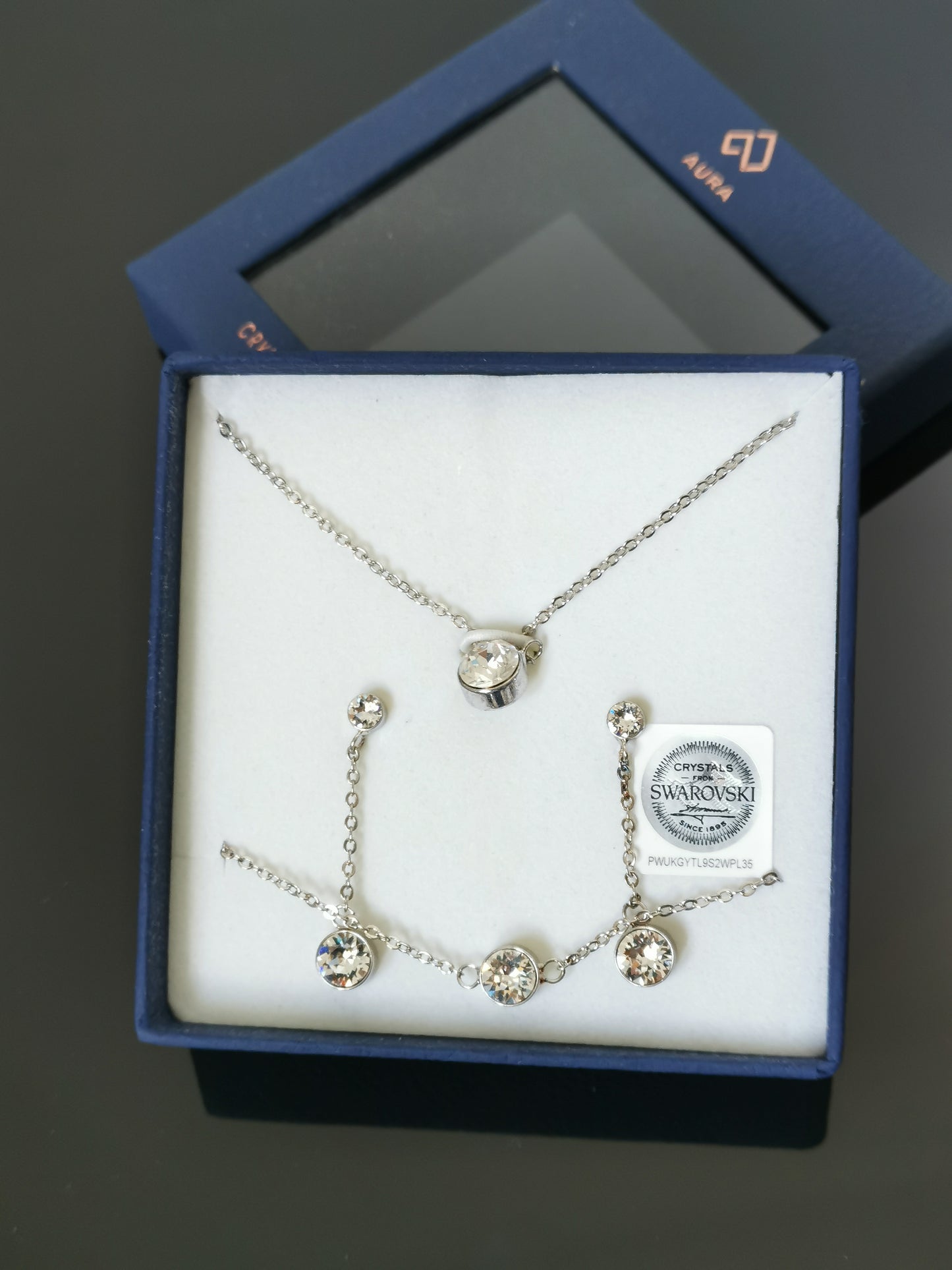 Sparkling set of Necklace, bracelet and earrings made with Swarovski Crystals